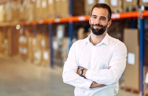 Man standing in his warehouse